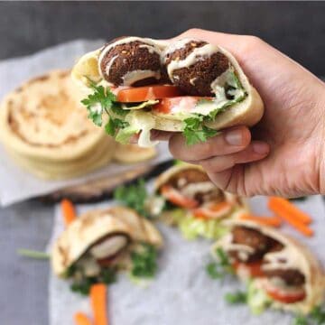 Falafel Pita Sandwich with Tahini Sauce #middleeasternfood #hummus #pitapockets #vegan #vegetarian #sandwiches