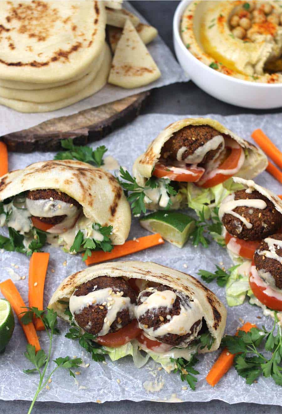 Falafel Pita Sandwich with Tahini Sauce #middleeasternfood #hummus #pitapockets #vegan #vegetarian #sandwiches