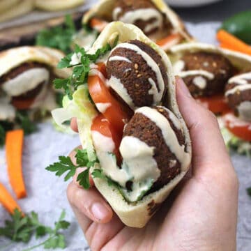 Best Pita sandwich (falafel sandwich) - vegan, plant-based sandwich with falafel, hummus, tahini.