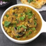 Matar mushroom masala recipe | Indian mushroom peas curry served with naan, roti, rice, etc.