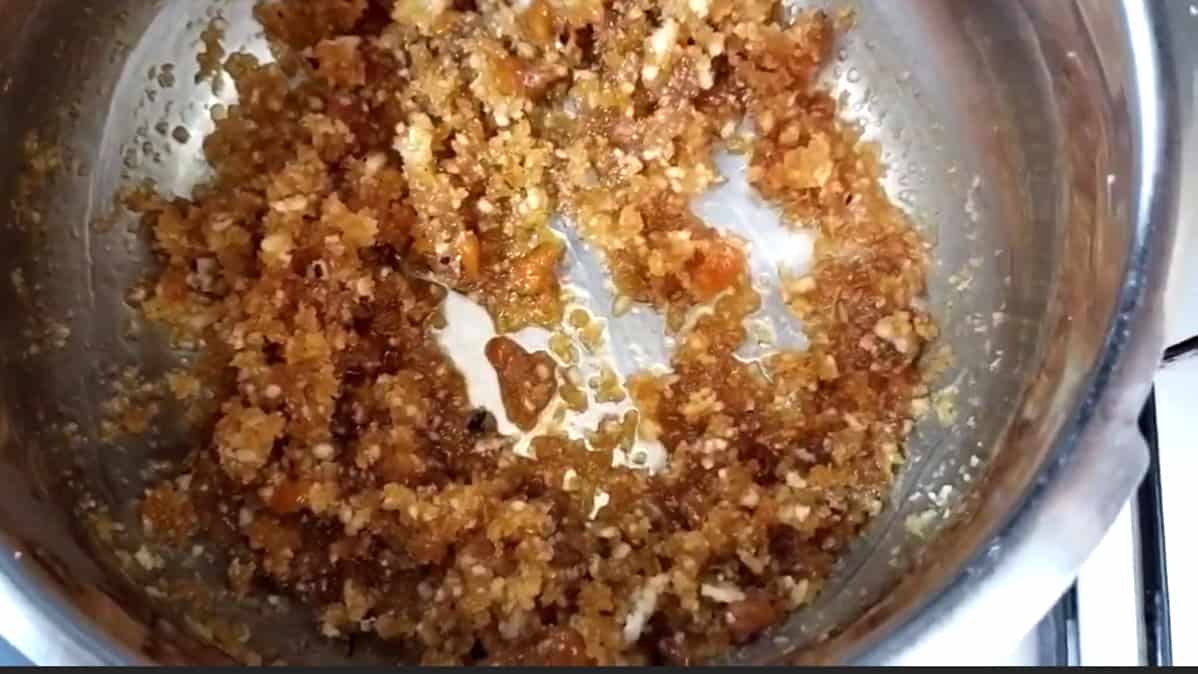 Mix jaggery and coconut and keep stirring. 