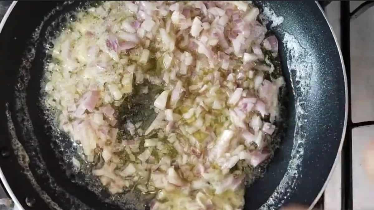 Cook onions in melted butter.