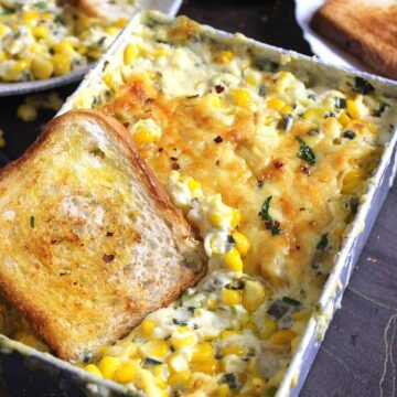 Baked corn cheese casserole, cheesy creamed corn recipe, easy side dish for Thanksgiving dinner