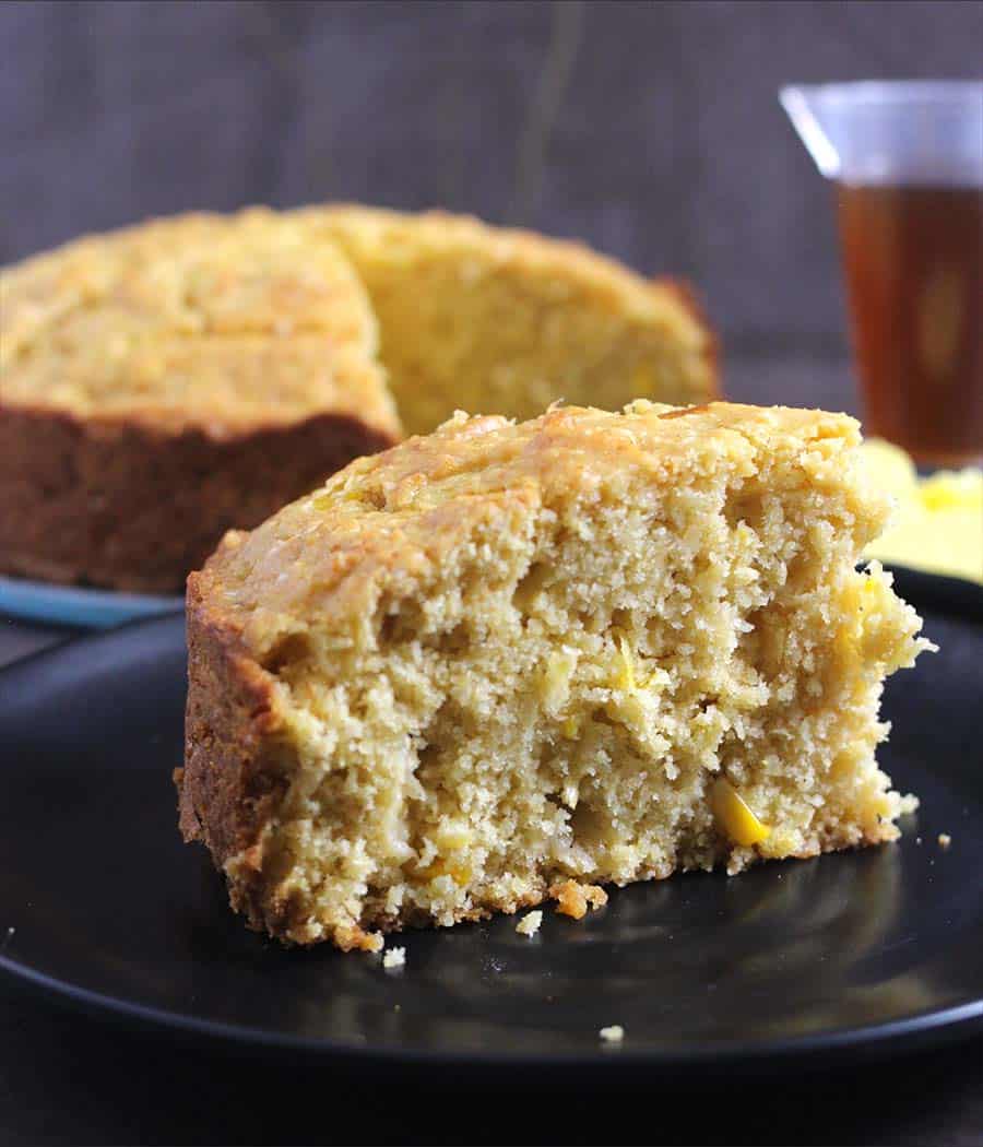 cornbread recipe for breakfast or side with lunch or dinner, dollop of butter and honey drizzle