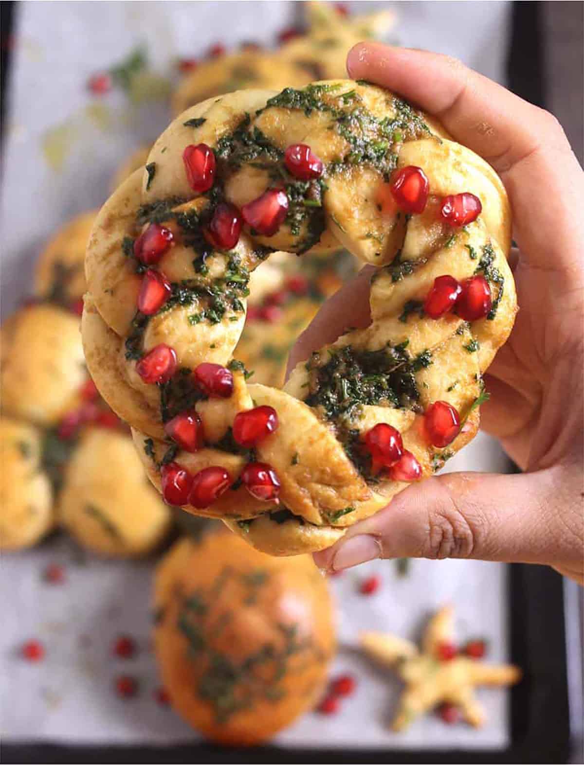 Holding Christmas Wreath Pull Apart Bread, Holiday themed Bread 
