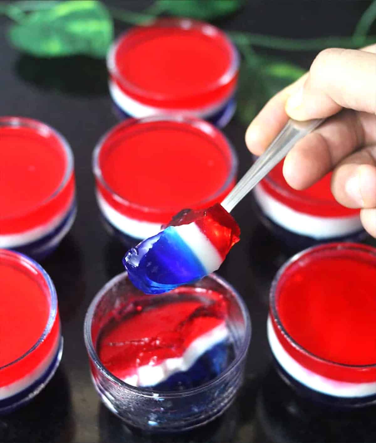 Red white and blue jello cups for independence day, memorial day or patriotic themed parties.