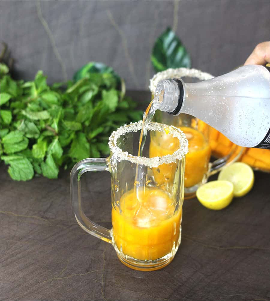 how to make mango margarita at home with fresh mangoes frozen mangoes, bar drinks, tipsy bartender