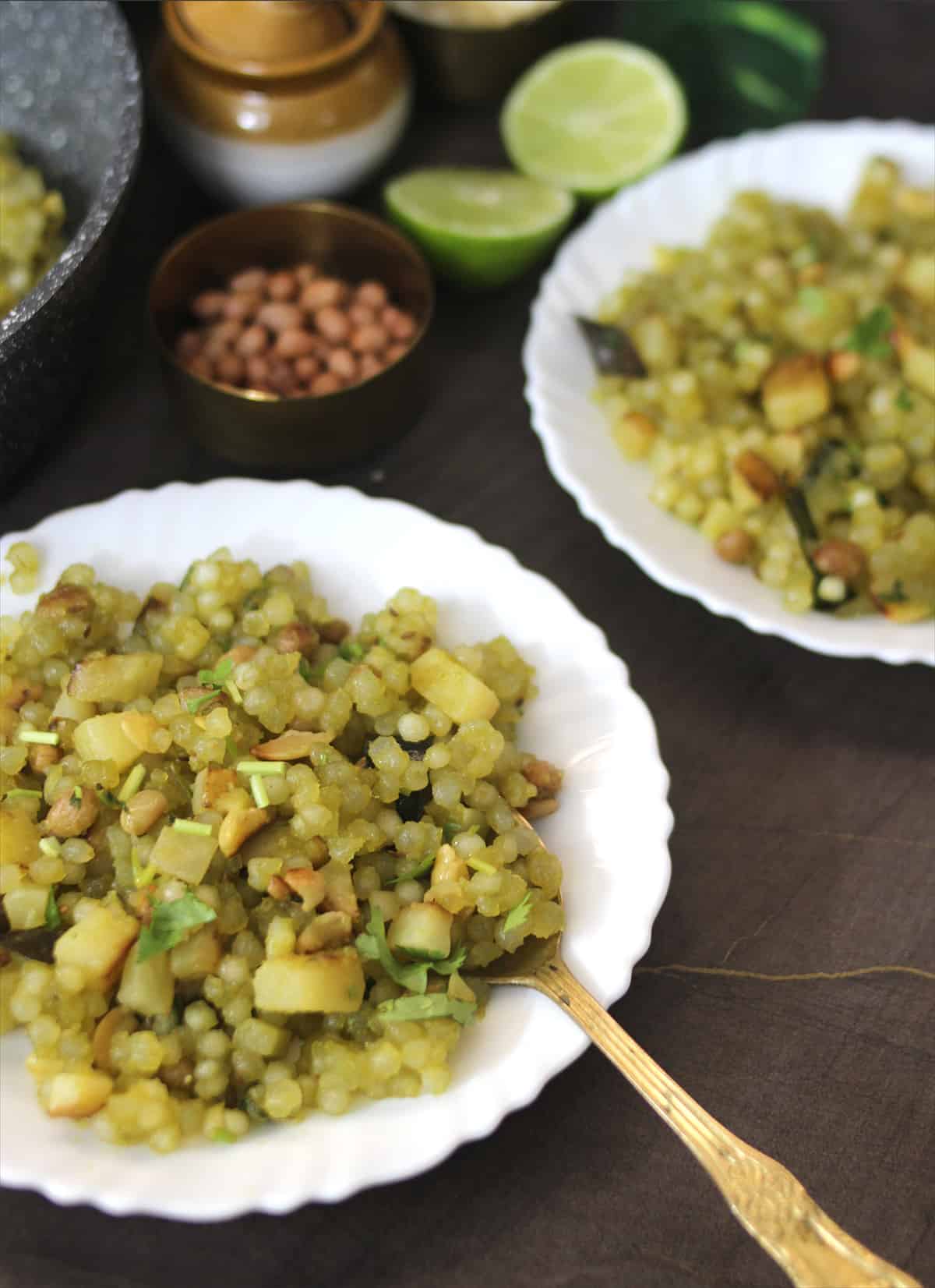 Hariyali Sabudana Khichdi recipe on white plate with golden spoon. Best indian breakfast, fasting, upvas, vrat recipe