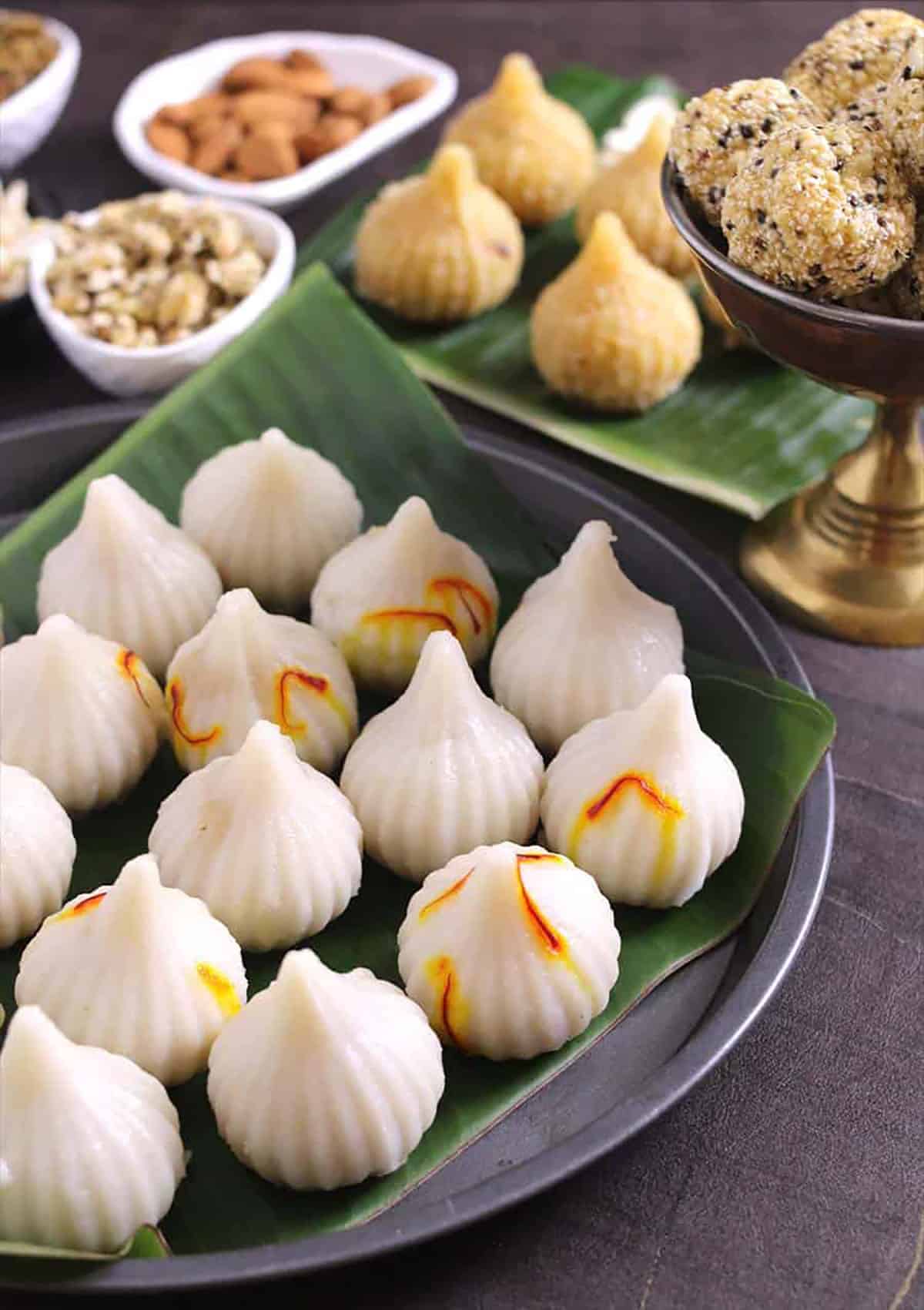 Ukadiche modak served along with laddus and other special prasad items prepared for Vinayaka Chaturthi.