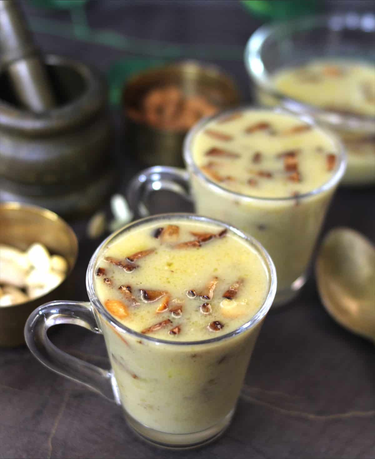 Jackfruit Payasam or Kathal Ki Kheer with almonds and cashews in background