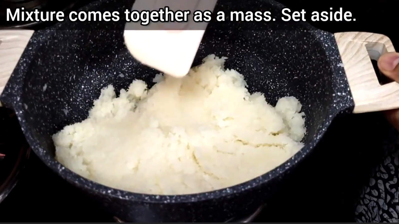 Mixture comes together as a mass. 
