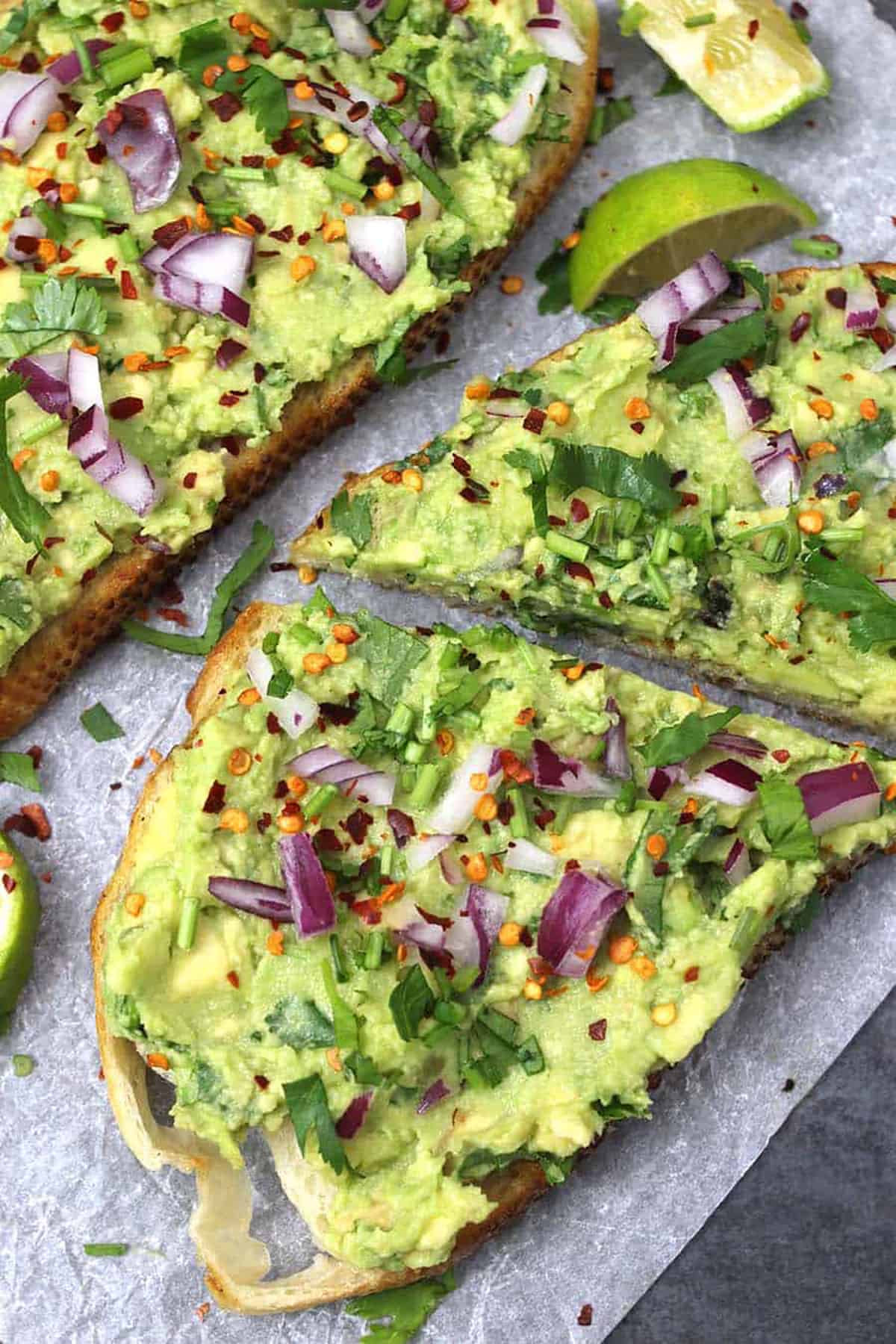 Perfect and easy avocado toast, with a simple topping of chopped onions and cilantro