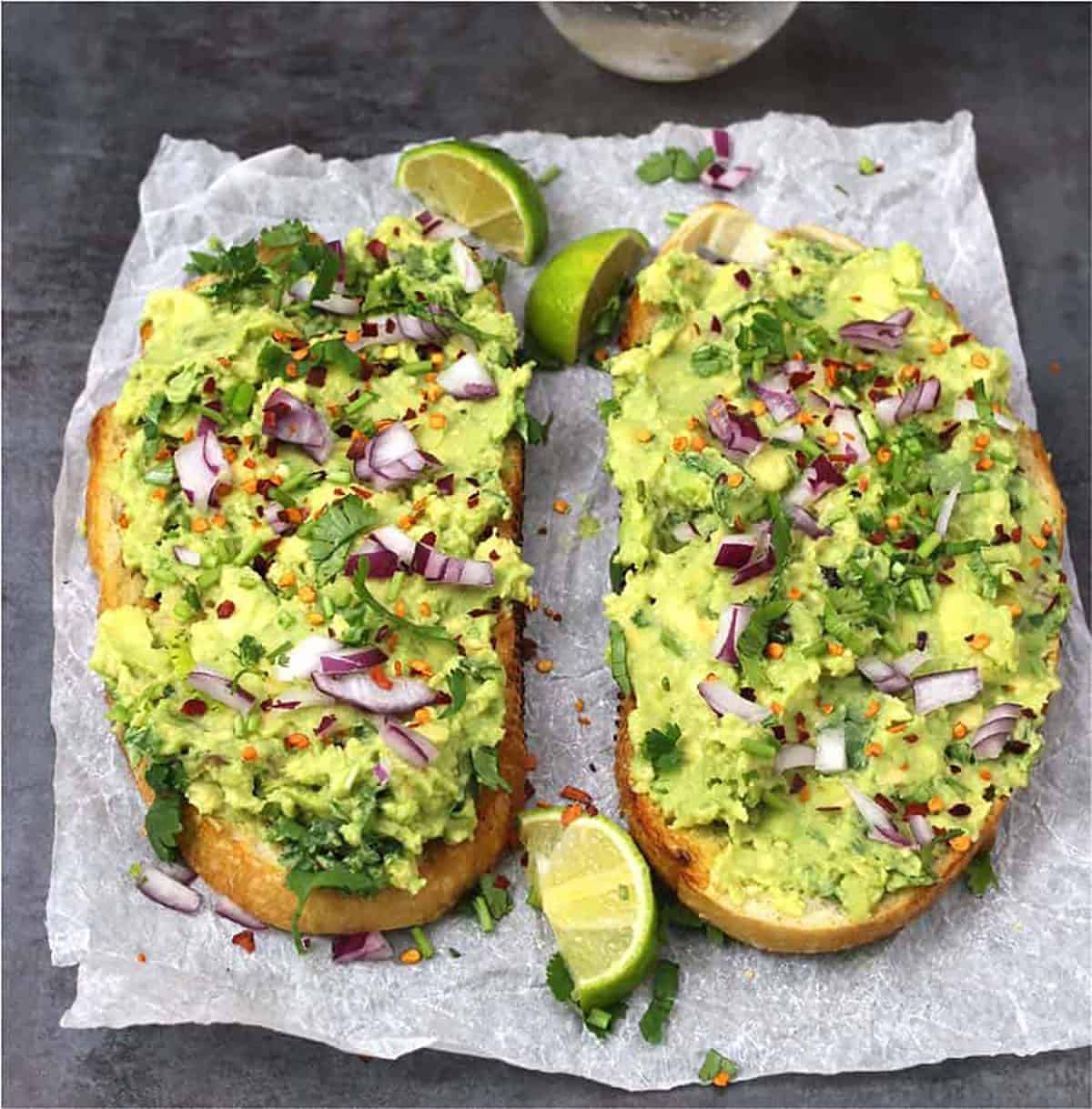 Best healthy breakfast toast with a spread of mashed avocados.
