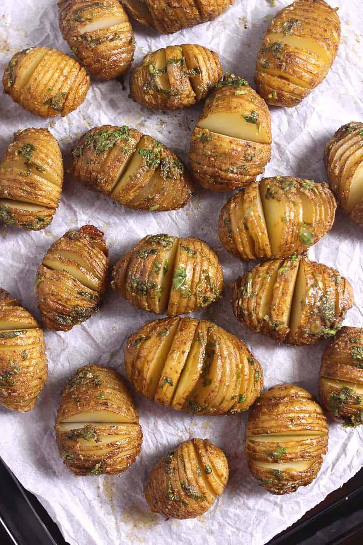 Top view of Perfect Hasselback Potatoes in a baking pan.