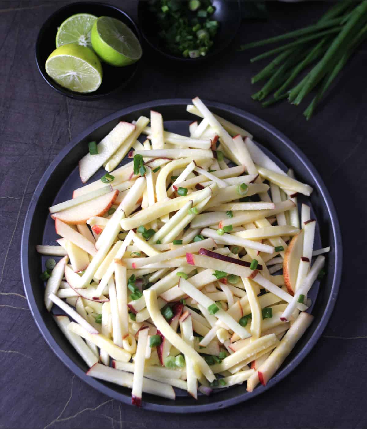 Top view of apple matchstick salad recipe with cheese in less than 5 minutes