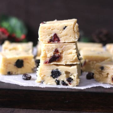 stack of best homemade white chocolate fudge with cranberries for holidays