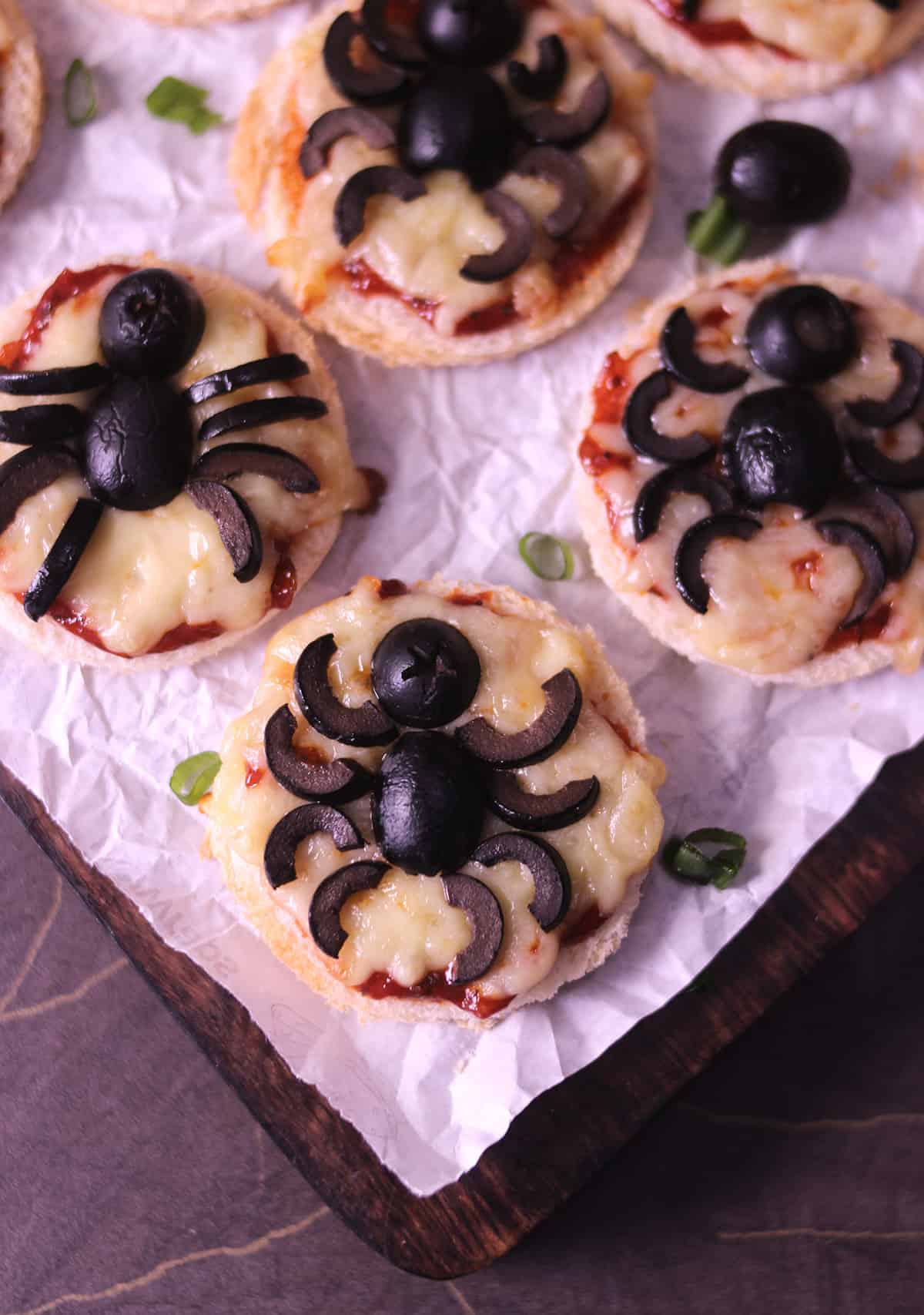 top view of spooky spider pizza for halloween themed party