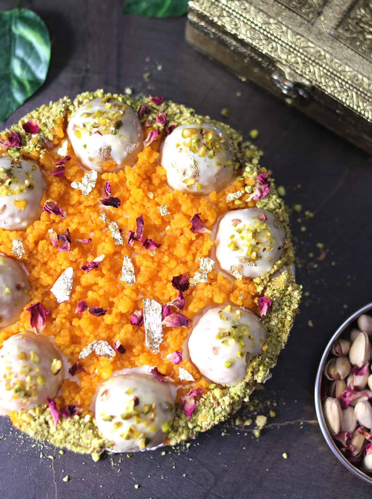 Top view of a holiday dessert, Diwali special no bake cheesecake with motichoor ladoo truffles