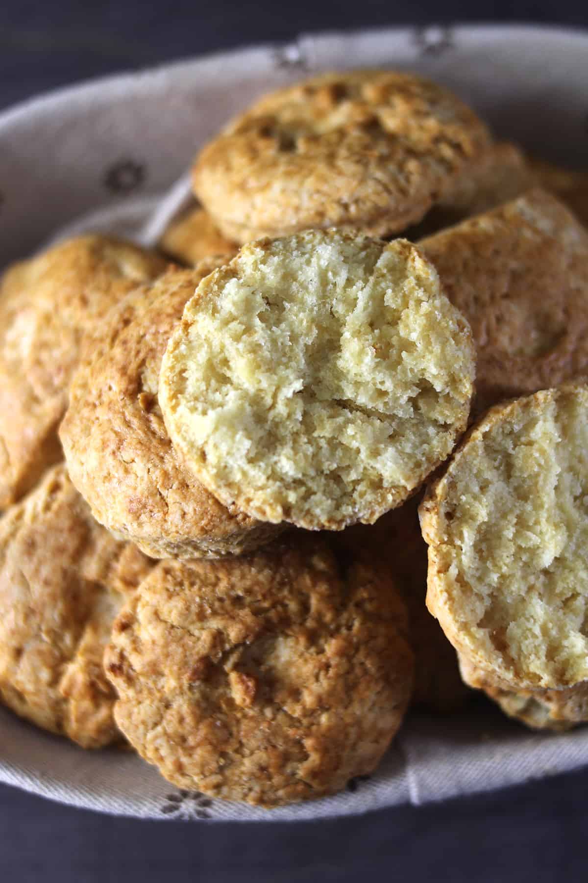 one biscuit opened to show the texture 