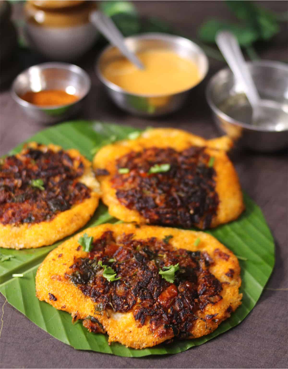 Street style spot idli (tawa idli) served on banana leaf