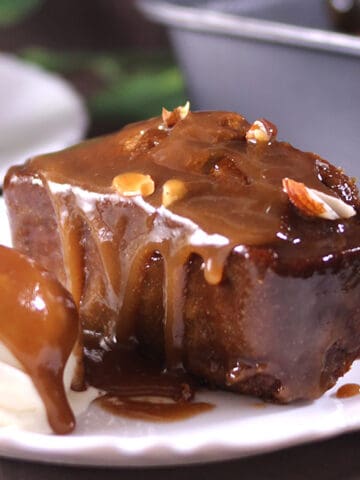 best sticky date pudding cake dessert with butterscotch sauce and ice cream, English toffee pudding