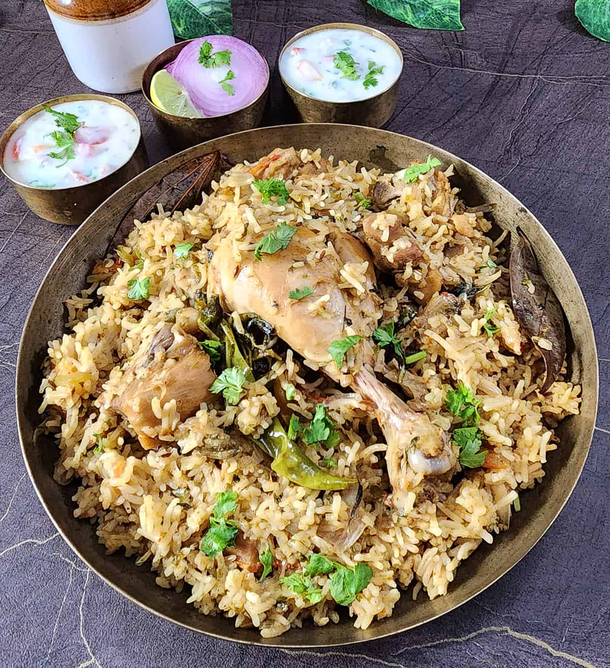 Simple one-pot chicken pulao or chicken rice pilaf with flavorful chicken thigh and leg pieces. 