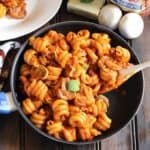 Pasta with Mushrooms in Creamy Tomato Sauce served in a nonstick pan.
