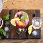 Cool and refreshing Blueberry Mojito cocktail served om a tall glass.