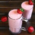 Easy and Delicious Strawberry Banana Smoothie served in a tall glass.