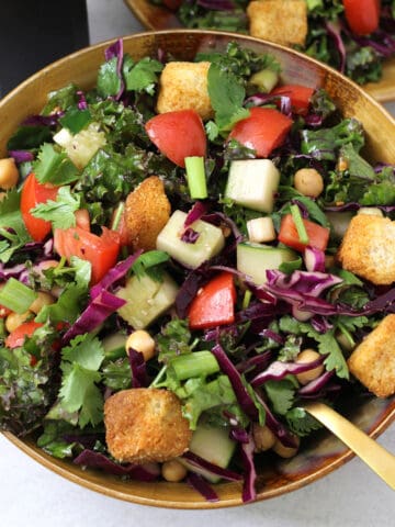 simple healthy kale chickpea salad in a serving bowl.