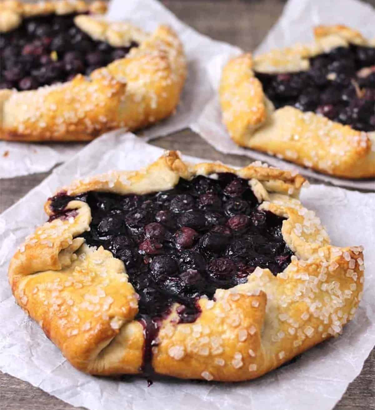 Quick and Easy blueberry galettes or crostatas using homemade pie pastry dough.