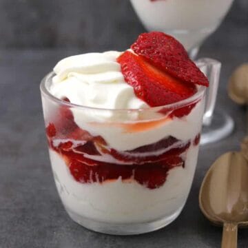 Easy and Delicious Strawberries and Cream served in a dessert glass.