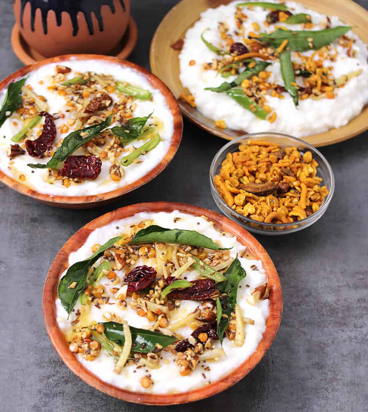 Spicy curd rice (thayir sadam or daddojanam) for a healthy low-calorie vegetarian meal in 2 bowls.