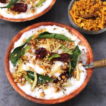 Best Indian curd rice (yogurt rice / thayir sadam) in a serving bowl with tadka or tempering.