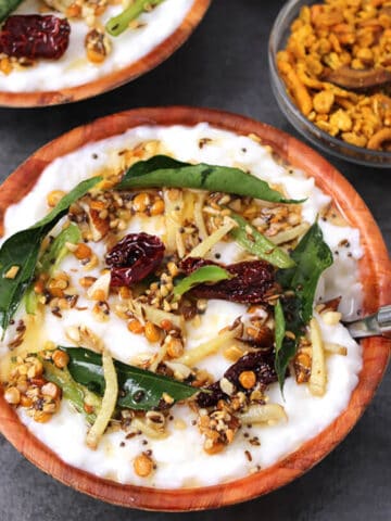 Best Indian curd rice (yogurt rice / thayir sadam) in a serving bowl with tadka or tempering.