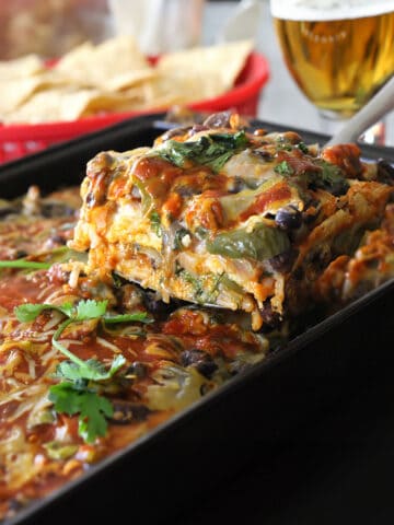 Vegetarian Mexican Lasagna (Enchilada Lasagna or Black bean Casserole) is served for dinner.