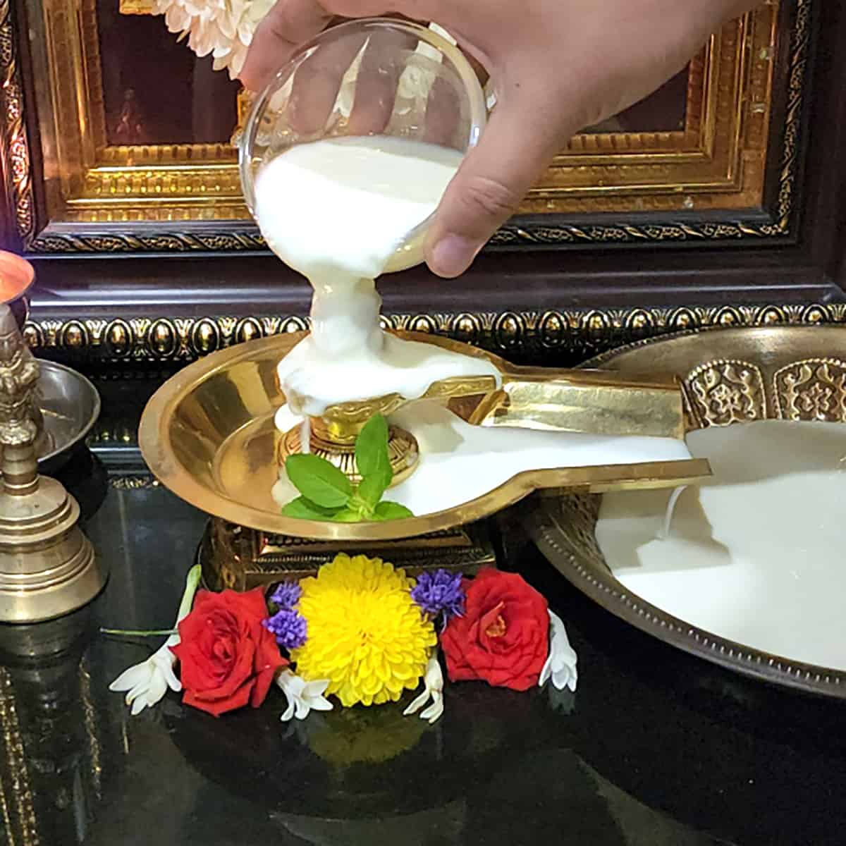 Add dahi (yogurt or curd) for panchamrit. 