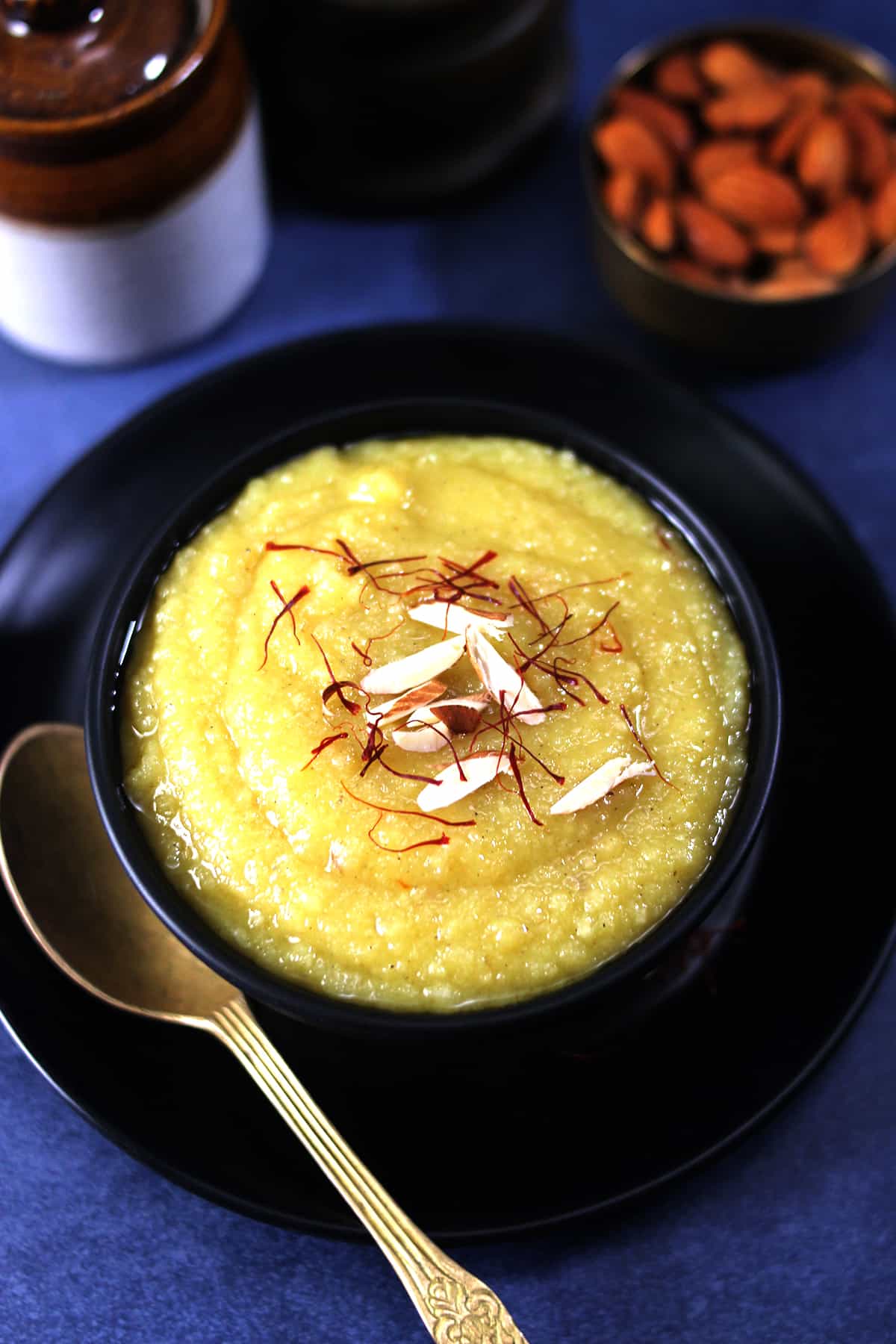 Traditional Indian badam halwa sweet or almond pudding with almonds and almond flour. 