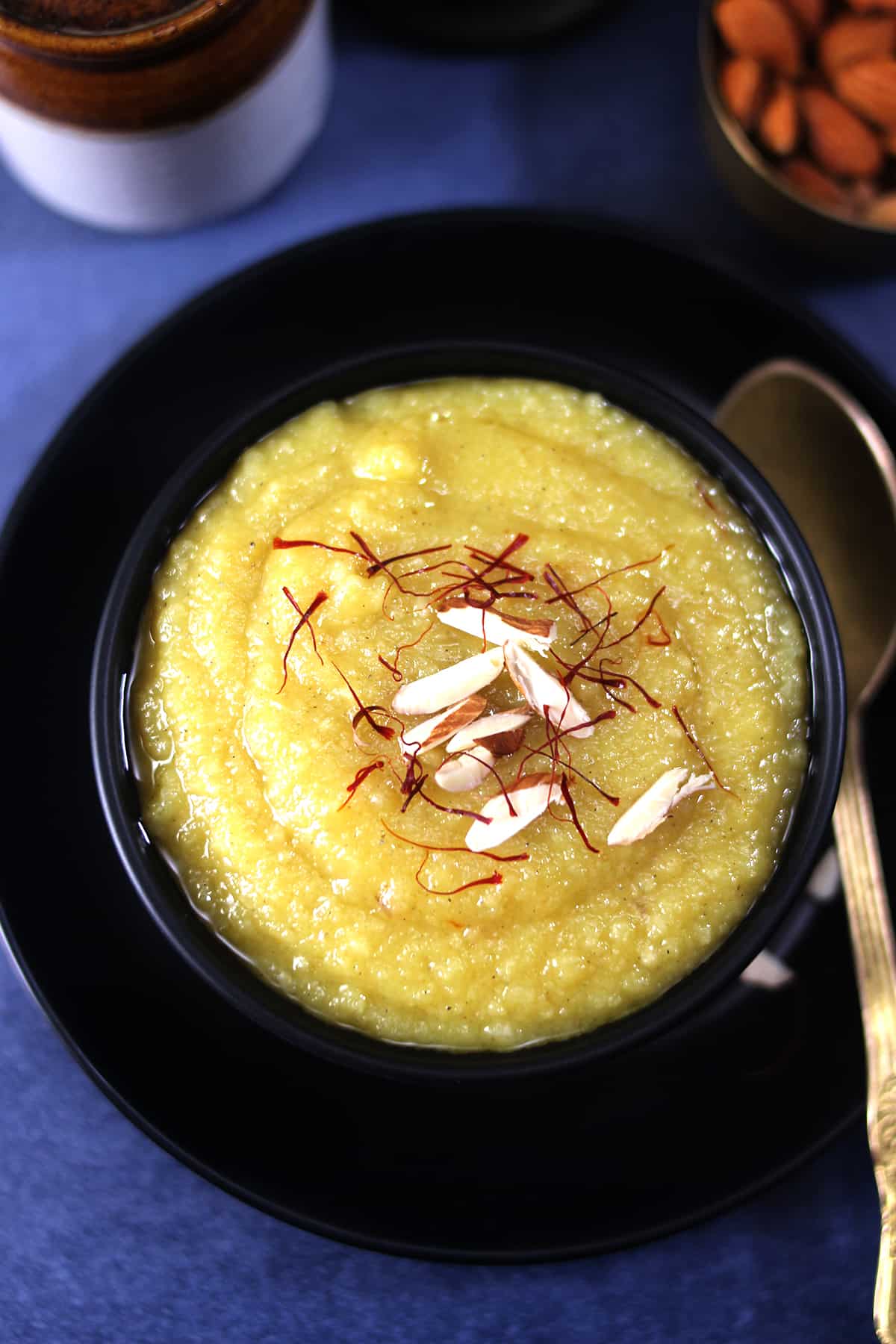 Best Badam Halwa Recipe (Easy Indian Almond Halwa Dessert) garnished with saffron, almonds. 