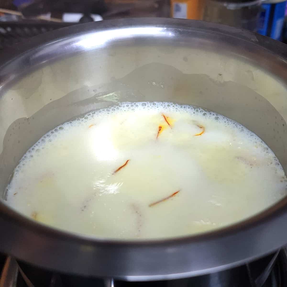 Bring milk and saffron to boil. 