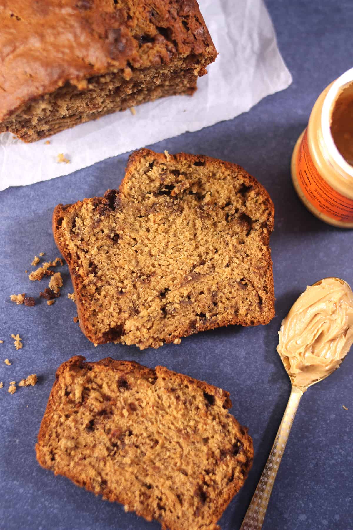 Slices of moist and rich, classic banana peanut butter bread with chocolate chips. 