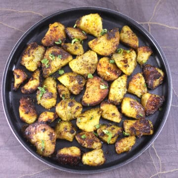 Crispy lemon-roasted potatoes | Garlic herbed potatoes - Best side dish and appetizer for dinner.