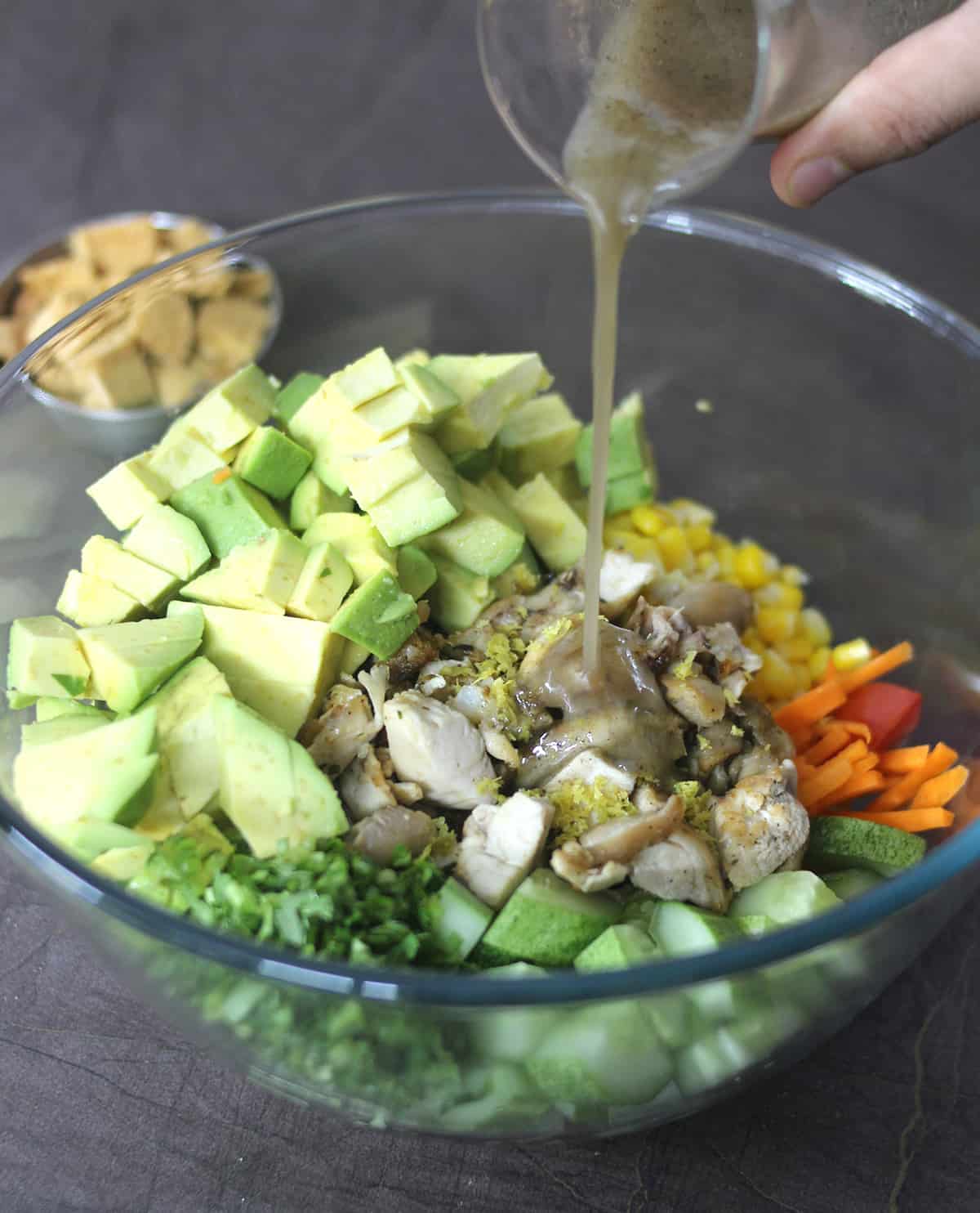 Combine all the salad ingredients and add lemon dressing. 