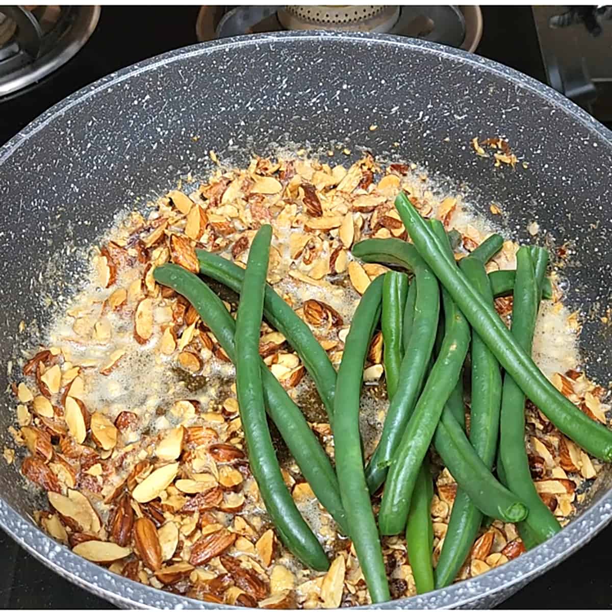 Add cooked green beans. 