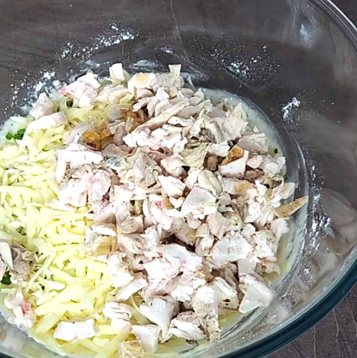 Add leftover chicken or cooked chicken, herbs and cheese.