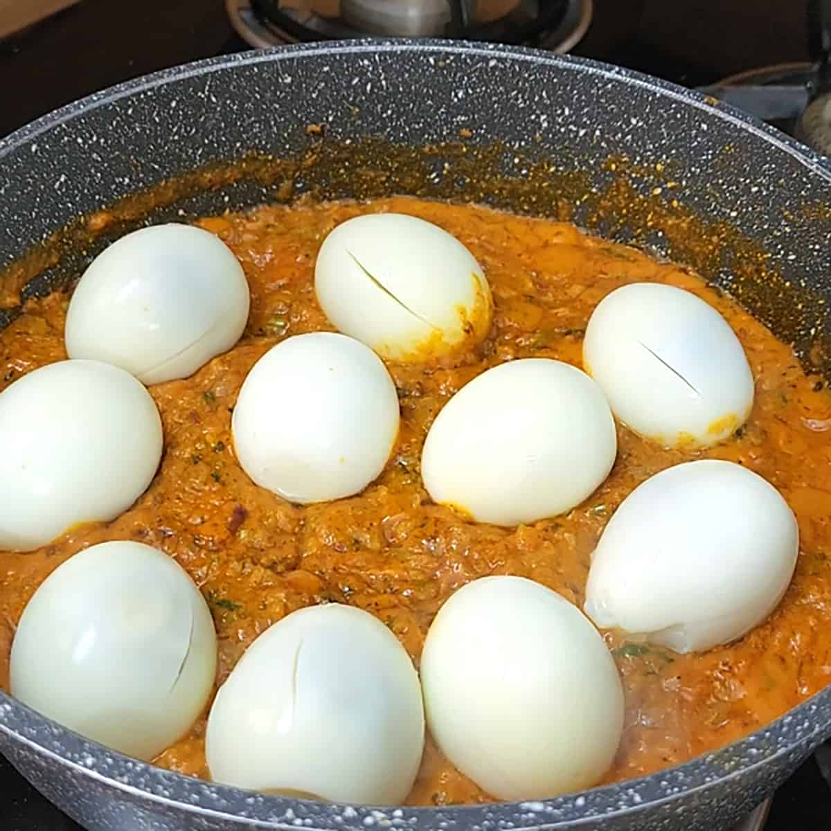 Add boiled eggs. 