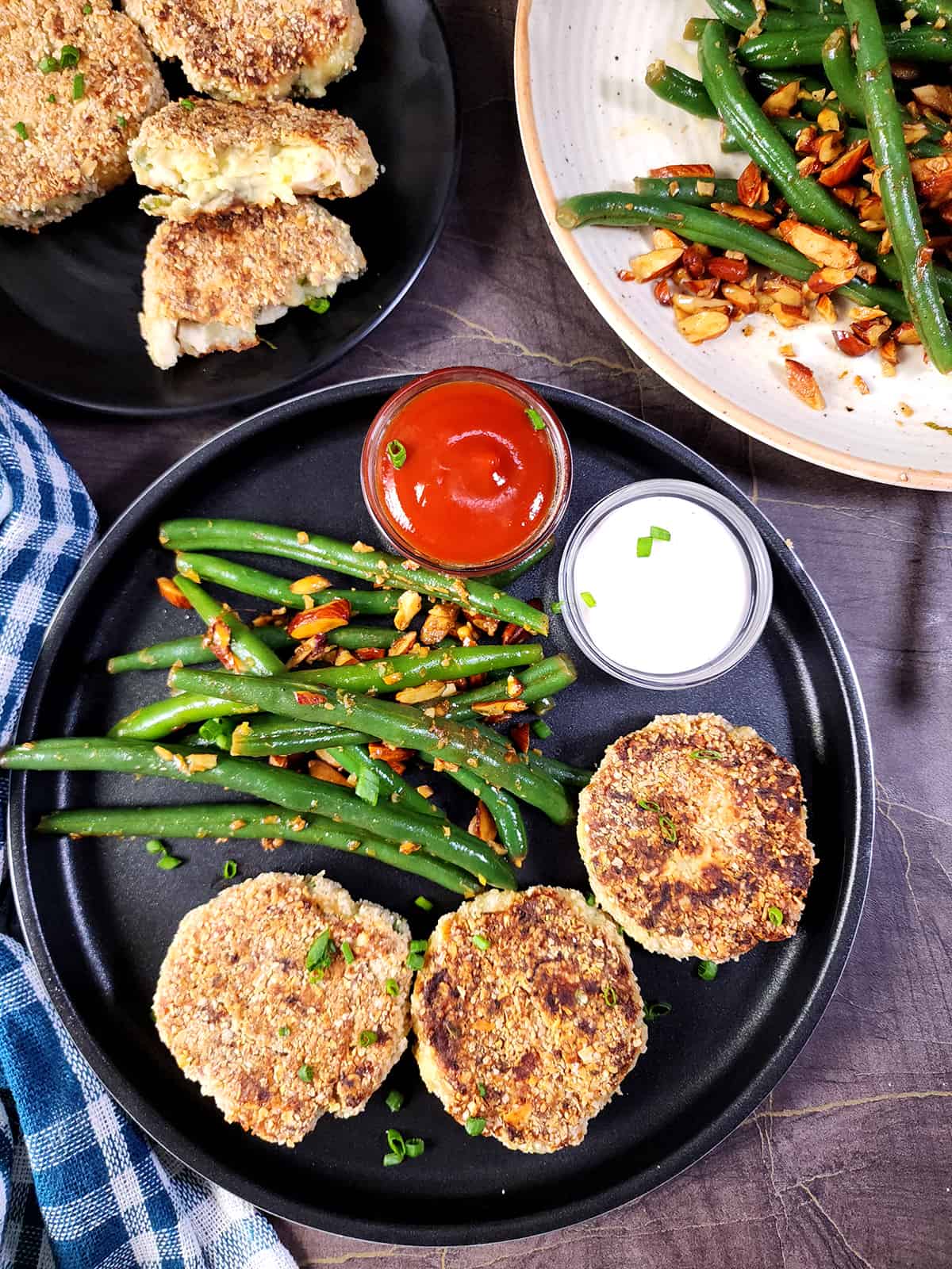 Easy chicken patties or quick chicken cutlet served with green beans almondine for a light meal. 
