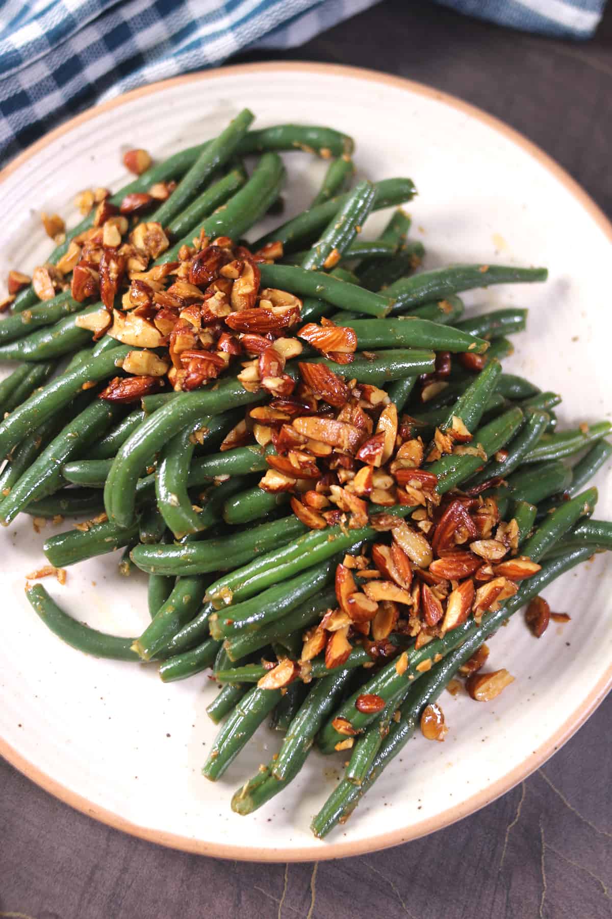 Classic french side dish for weeknight or holiday dinner - Green beans almondine.