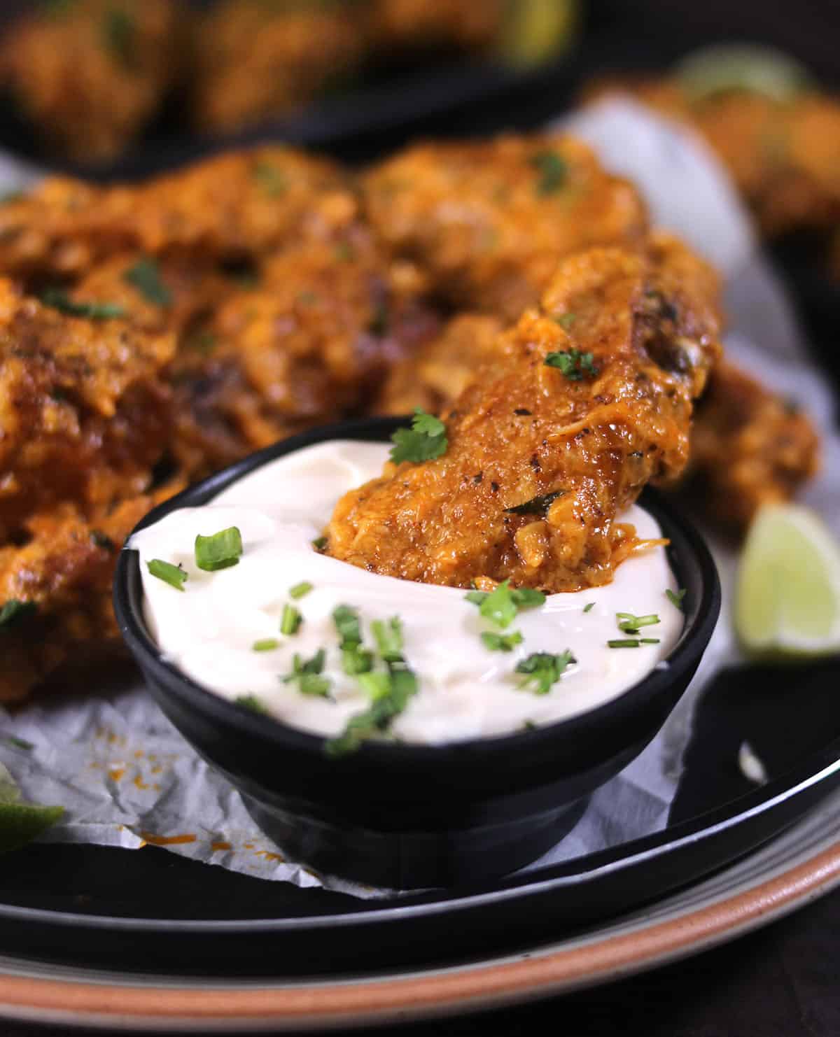 Fried chicken wings tossed in creamy garlic butter sauce. Easy chicken appetizer or finger food.