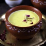 Rabdi (Rabri) - Indian sweet dessert made with milk, sugar, cardamom, saffron and nuts.